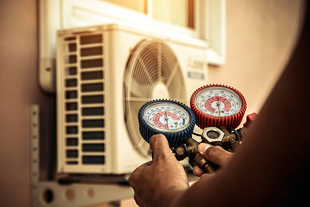 Professional Air Conditioning Service technician working in Detroit, MI
